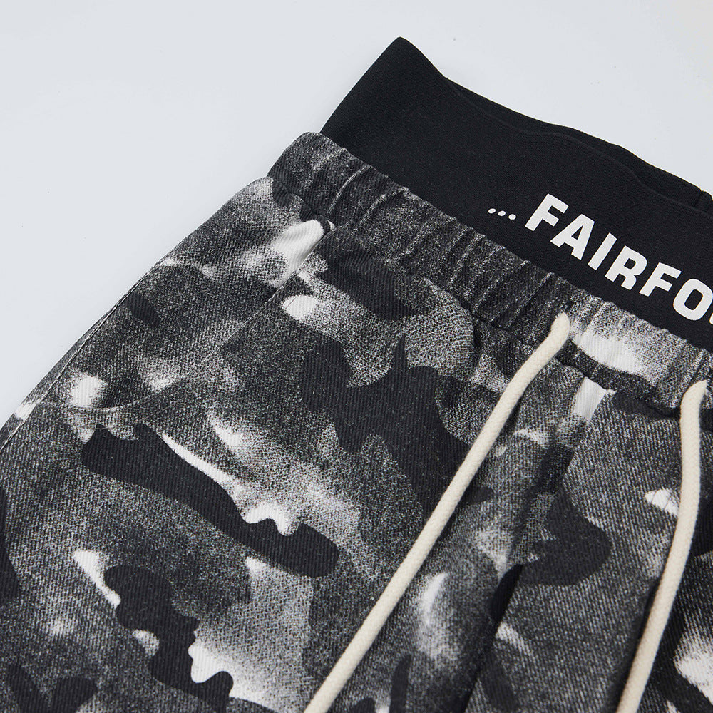 Pantalones deportivos con cinturilla de camuflaje deshilachada