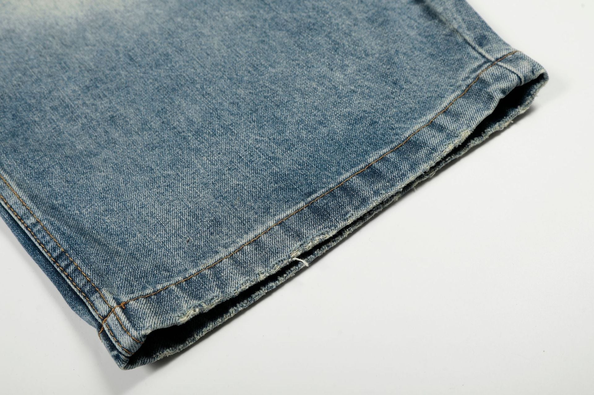 Washed Whisker Curved Denim Jeans