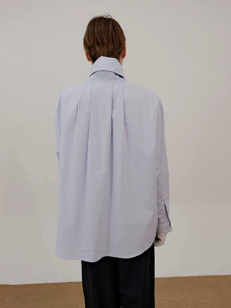 Camicia a maniche lunghe con collo alto e risvolto