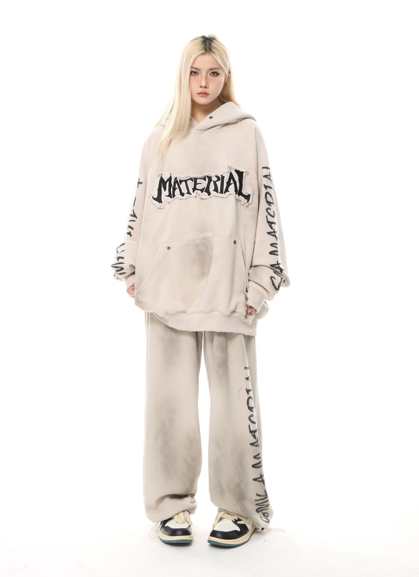 Sudadera con capucha bordada y estampado "Material"