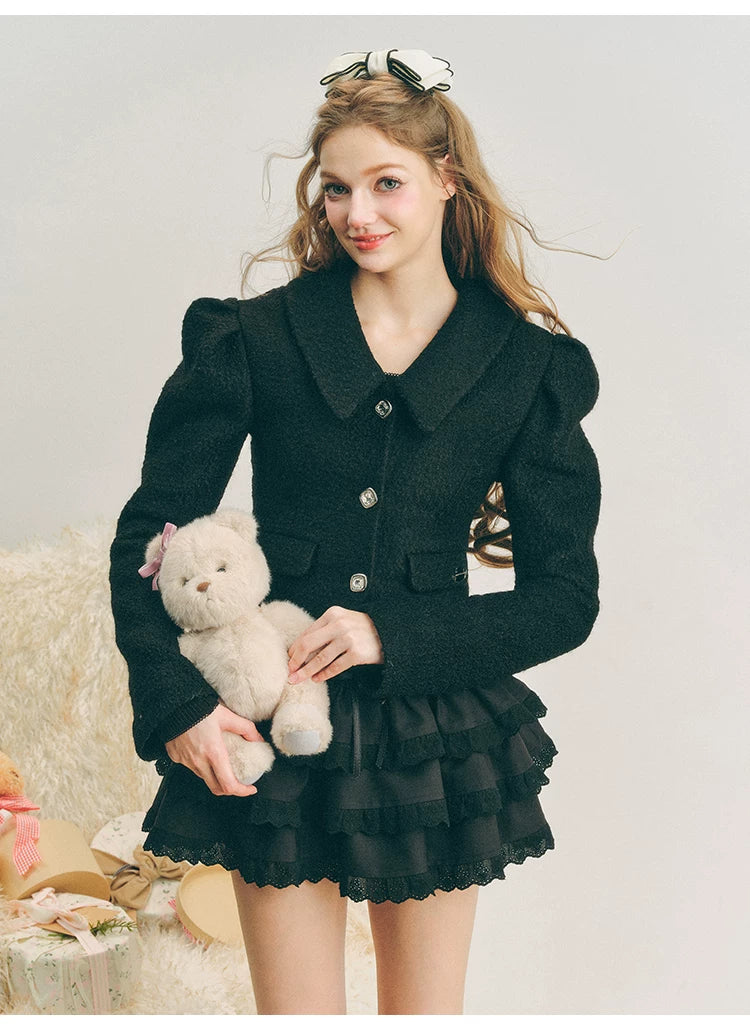 Chaqueta de lana con mangas abullonadas cortas y lazo