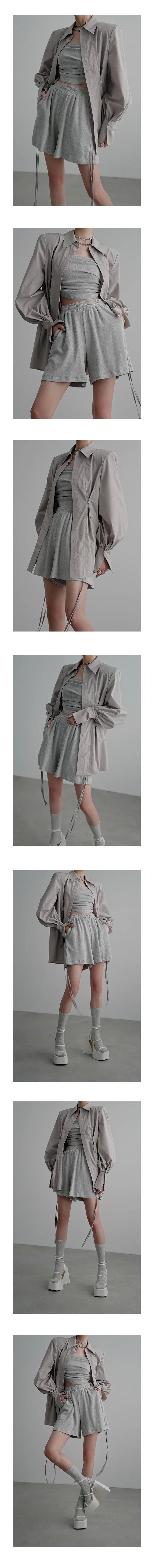 Chemise longue à taille cintrée et fermeture éclair