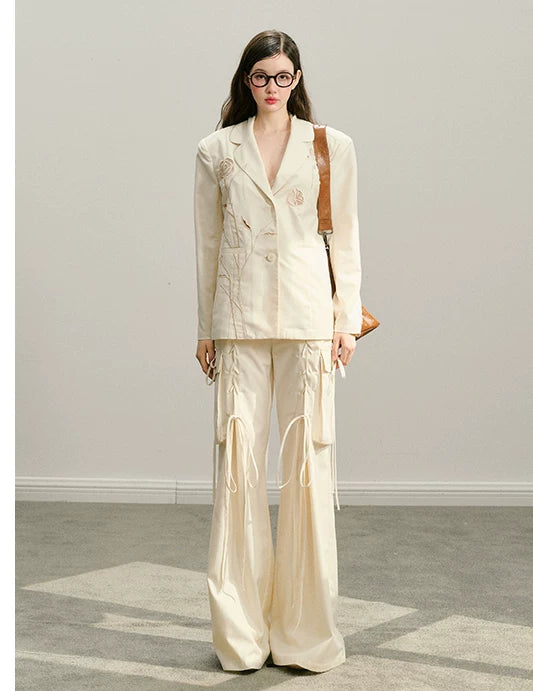 Ensemble veste ajourée et jupe courte à broderie rose