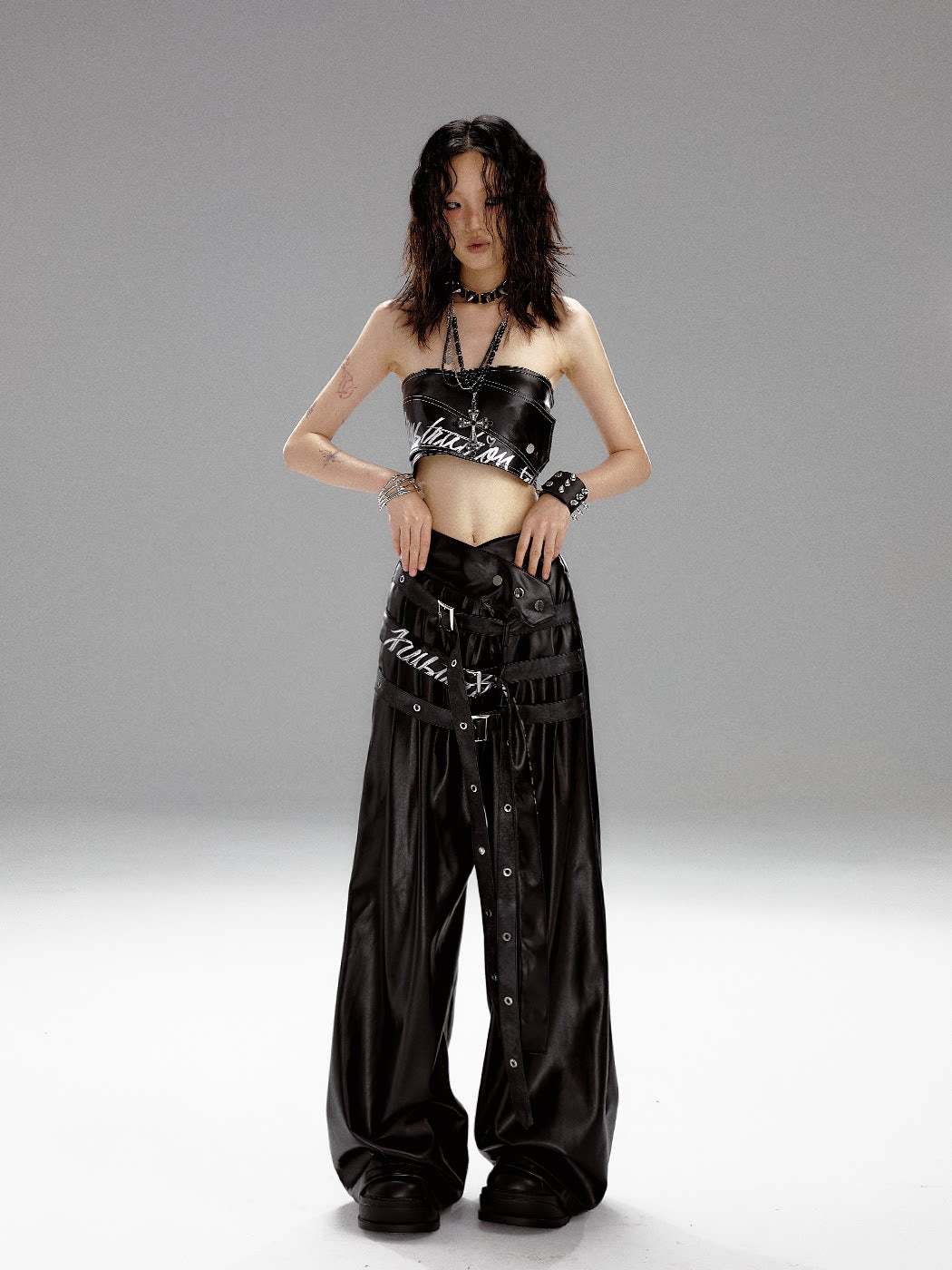 High-Waist V-Cut Graffiti Print Belted Black PU Leather Pants