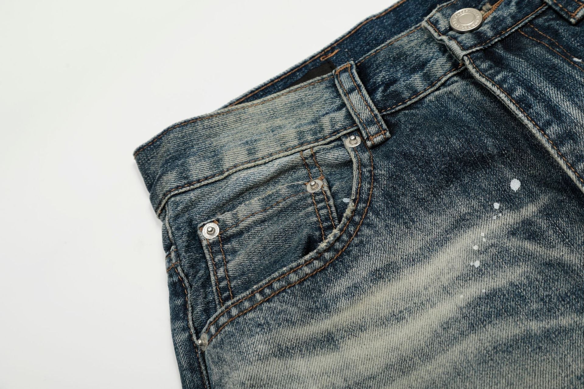 Washed Whisker Paint Splatter Curved Denim Jeans