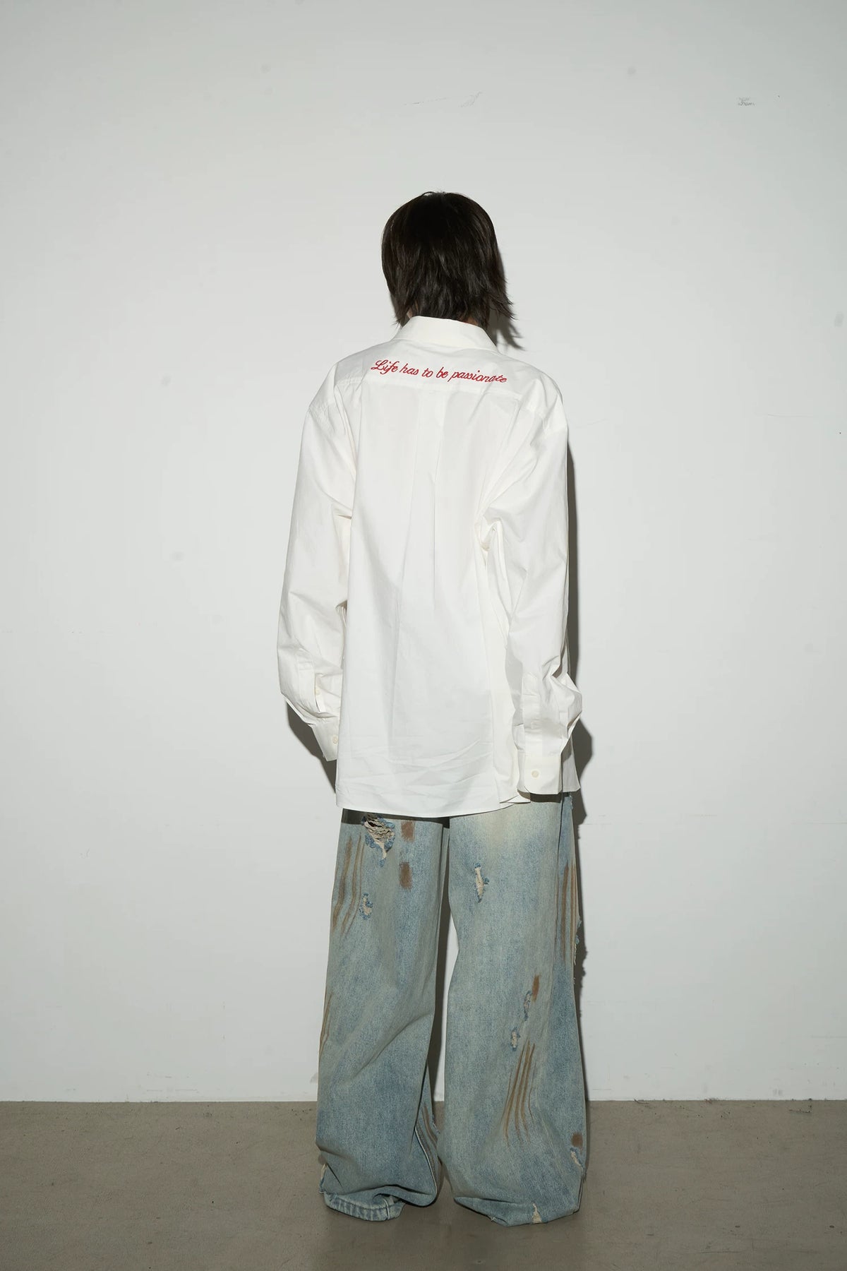 Rust Fade Damage Wash Draped Wide Leg Denim Jeans