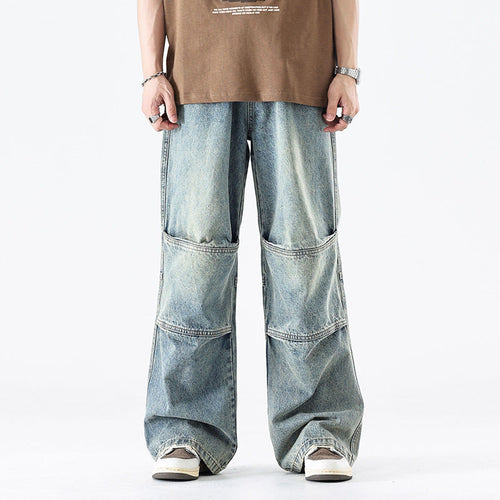 Gewaschene Patchwork-Jeans mit weitem Bein und Faltenoptik - Blau / S