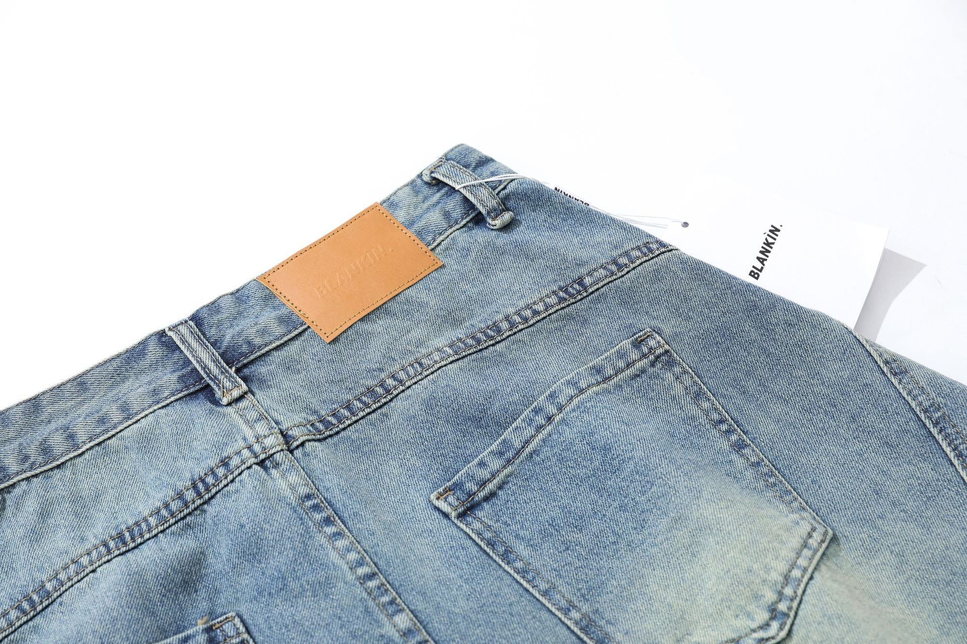 Washed Whisker Curved Cropped Denim Jeans