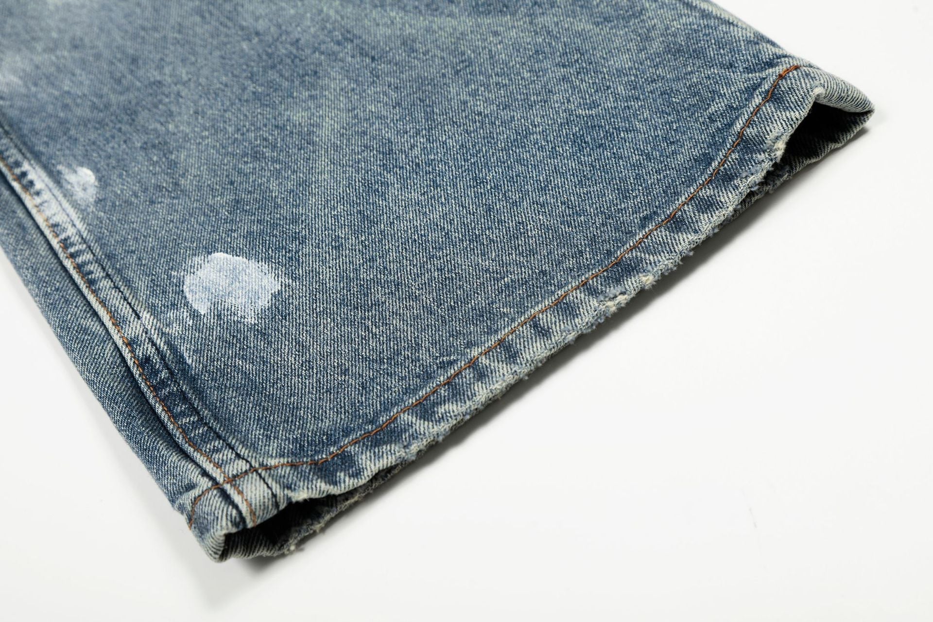 Paint Splatter Curved Denim Jeans