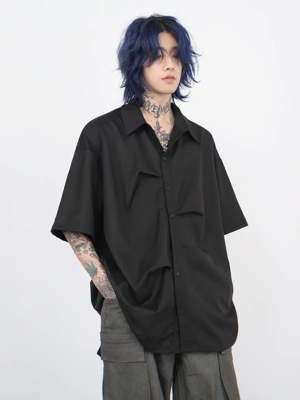 Camicia oversize a maniche corte con pieghe