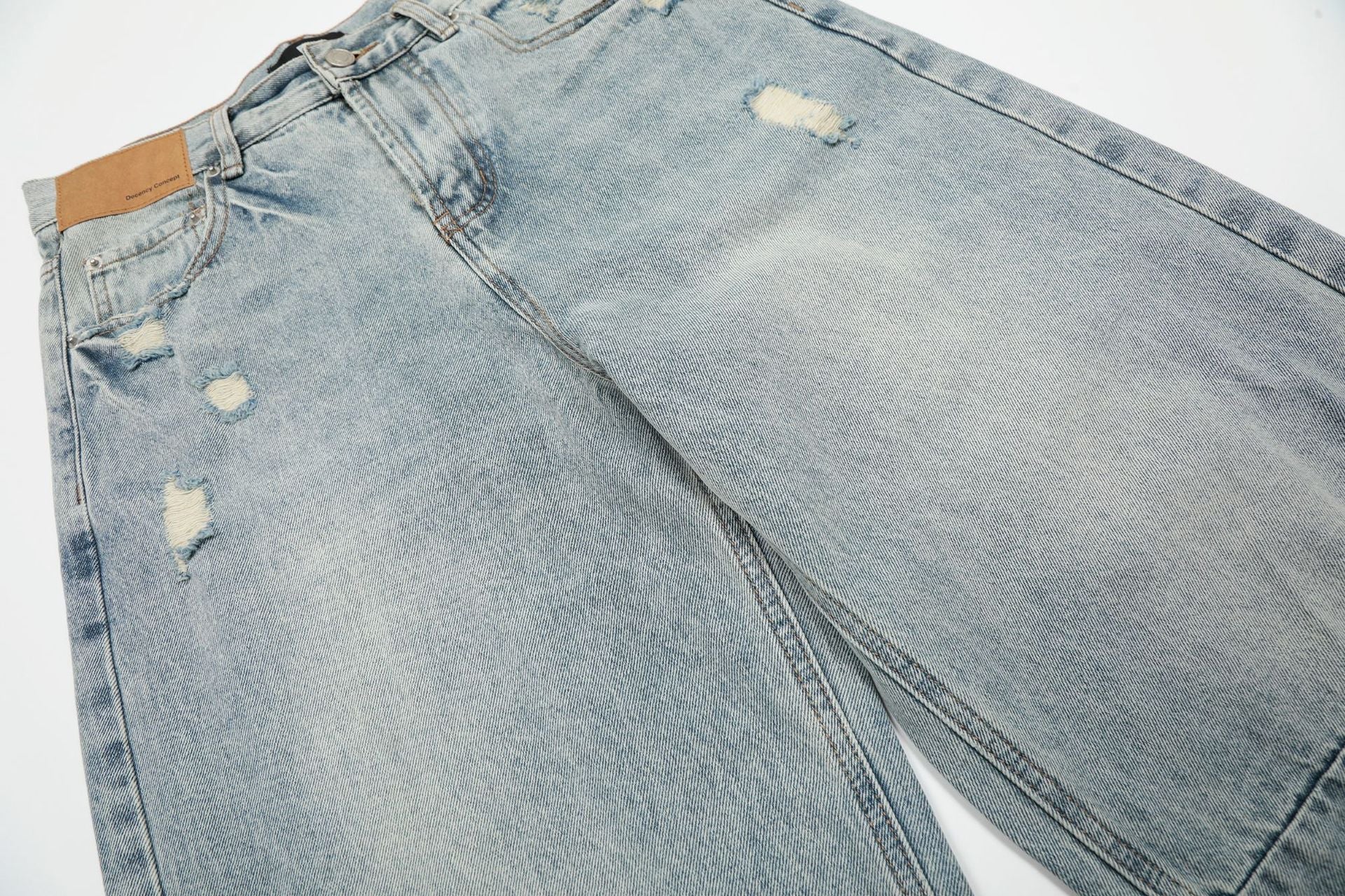 Wash Damage Wide Leg Curved Denim Jeans