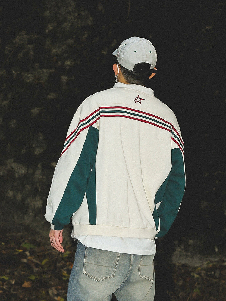 Polo de manga larga con diseño de letras de grafiti