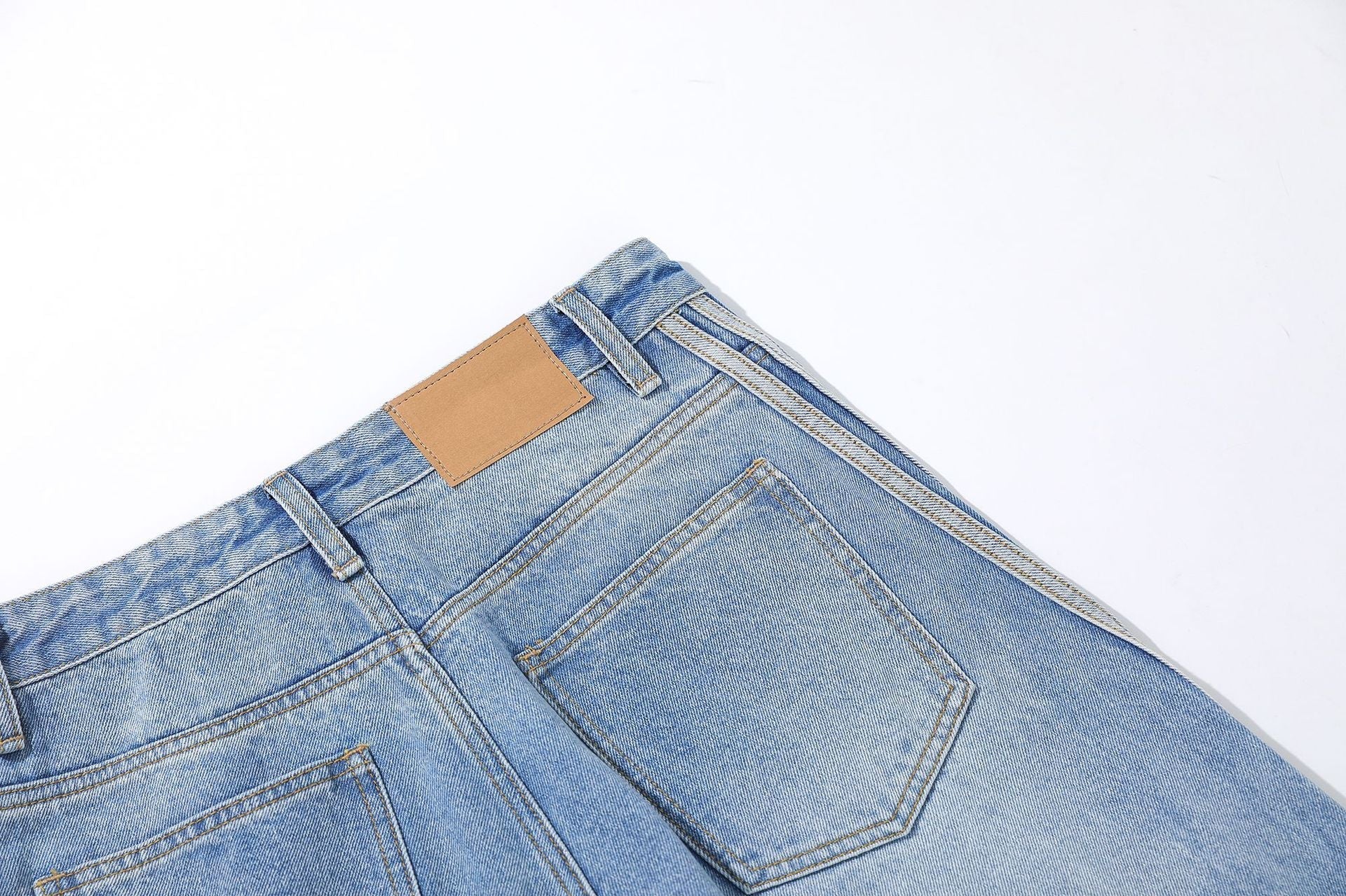 Washed Whisker Pin Tuck Wide Leg Denim Jeans