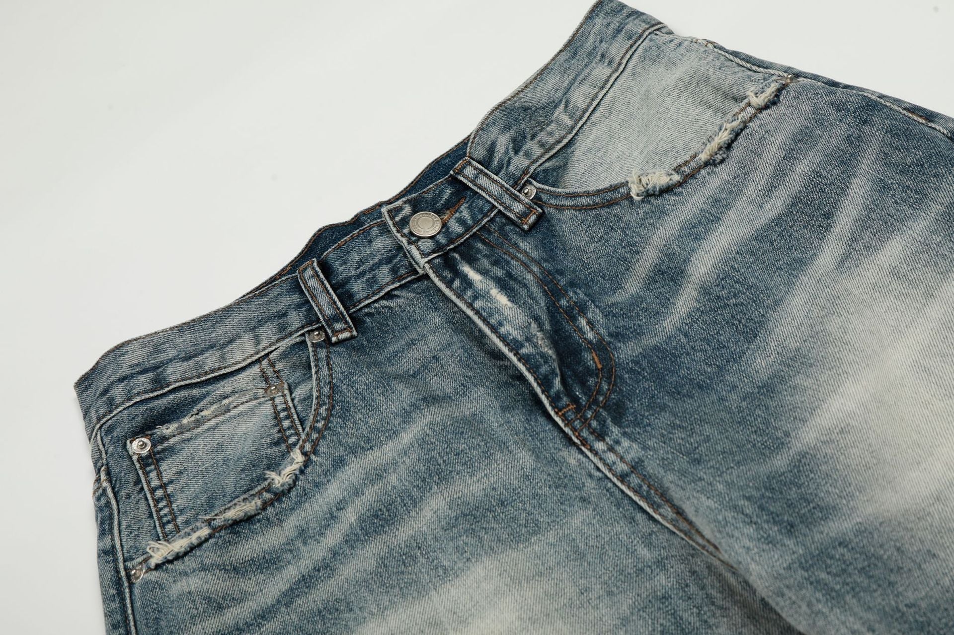 Washed Whisker Damage Curved Denim Jeans
