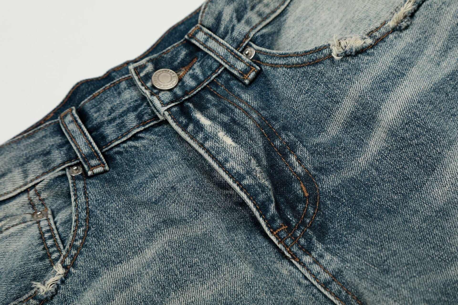 Washed Whisker Damage Curved Denim Jeans