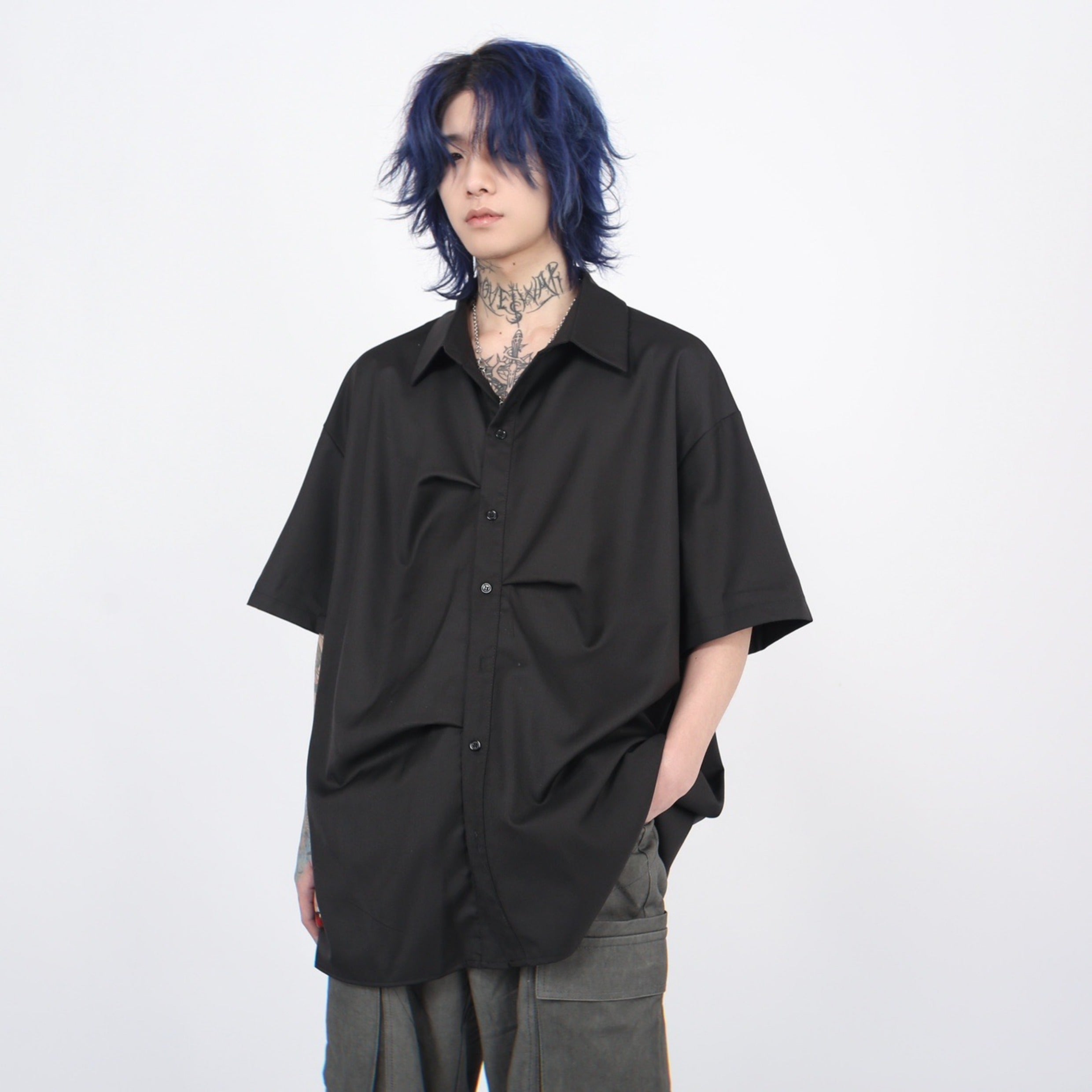 Camicia oversize a maniche corte con pieghe