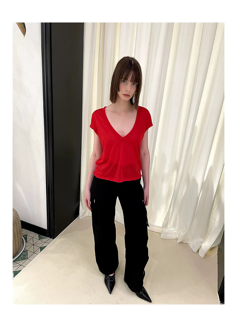 Pantalones cargo irregulares con múltiples bolsillos