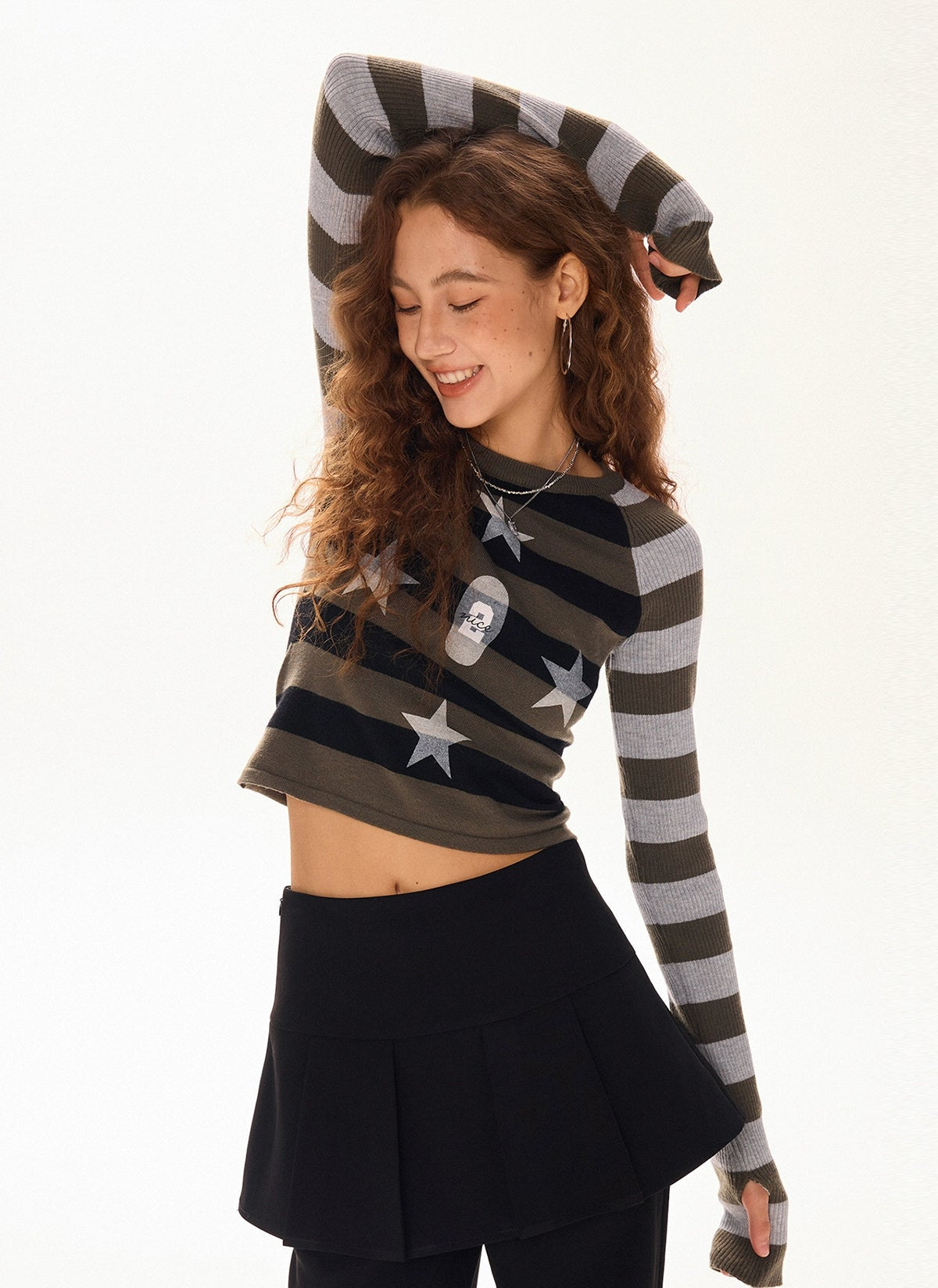 Pull court en maille rayée