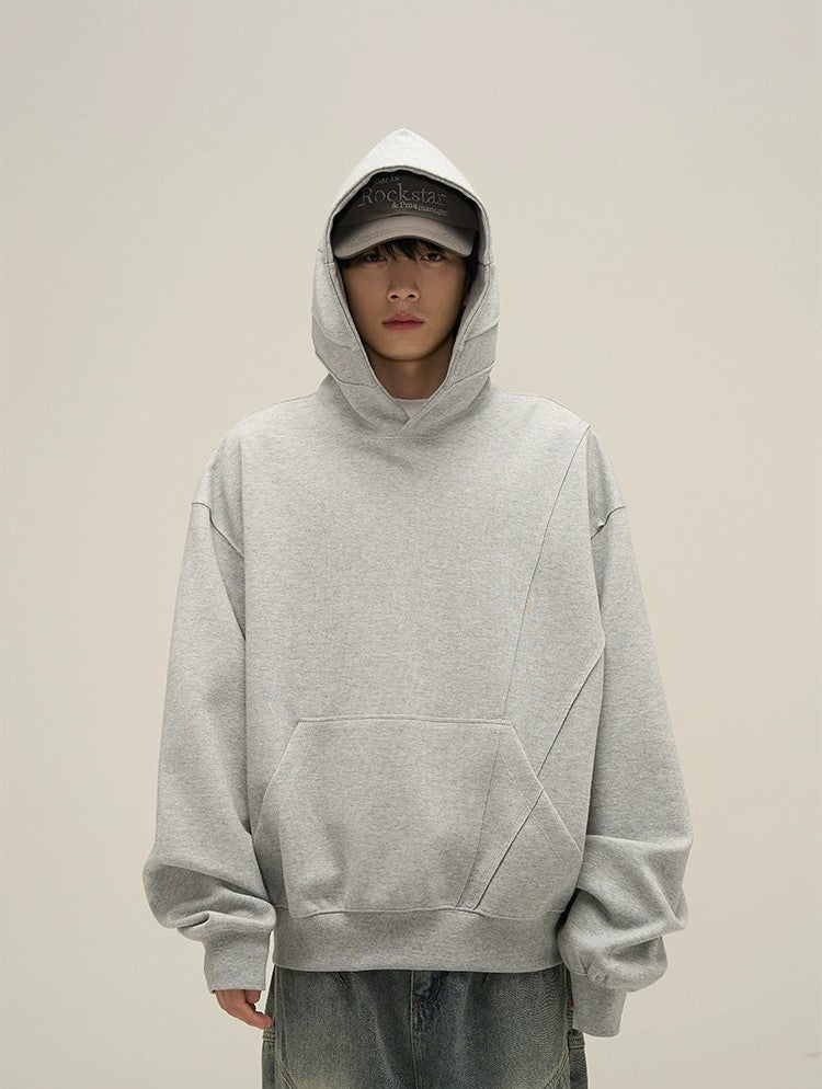 Felpa con cappuccio oversize decostruita