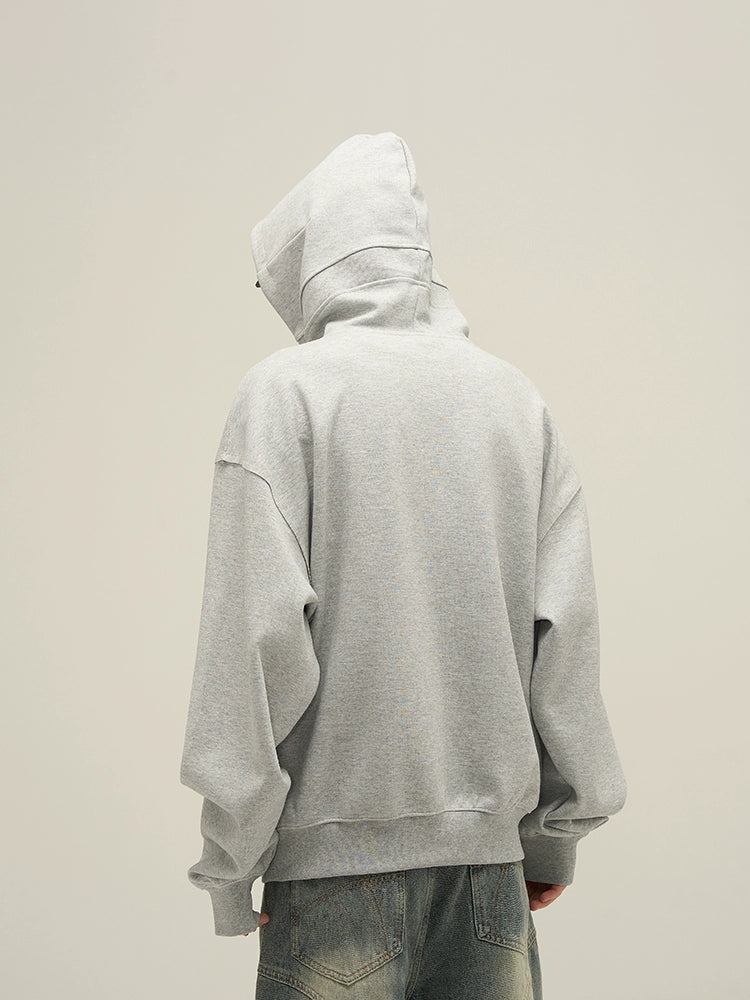 Felpa con cappuccio oversize decostruita