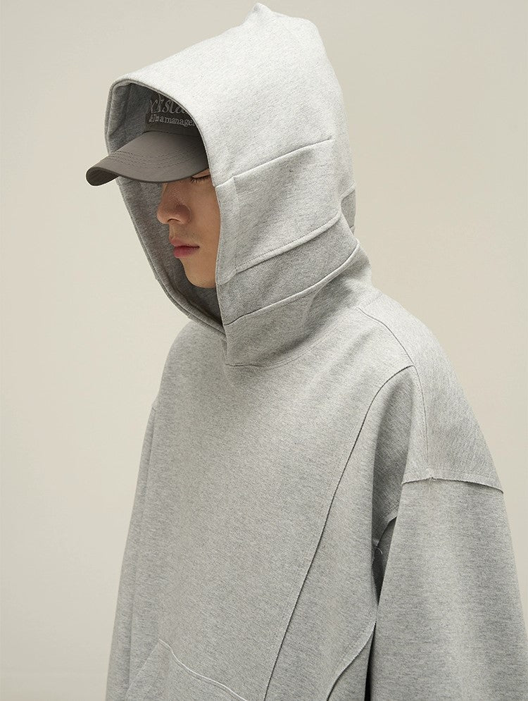 Felpa con cappuccio oversize decostruita
