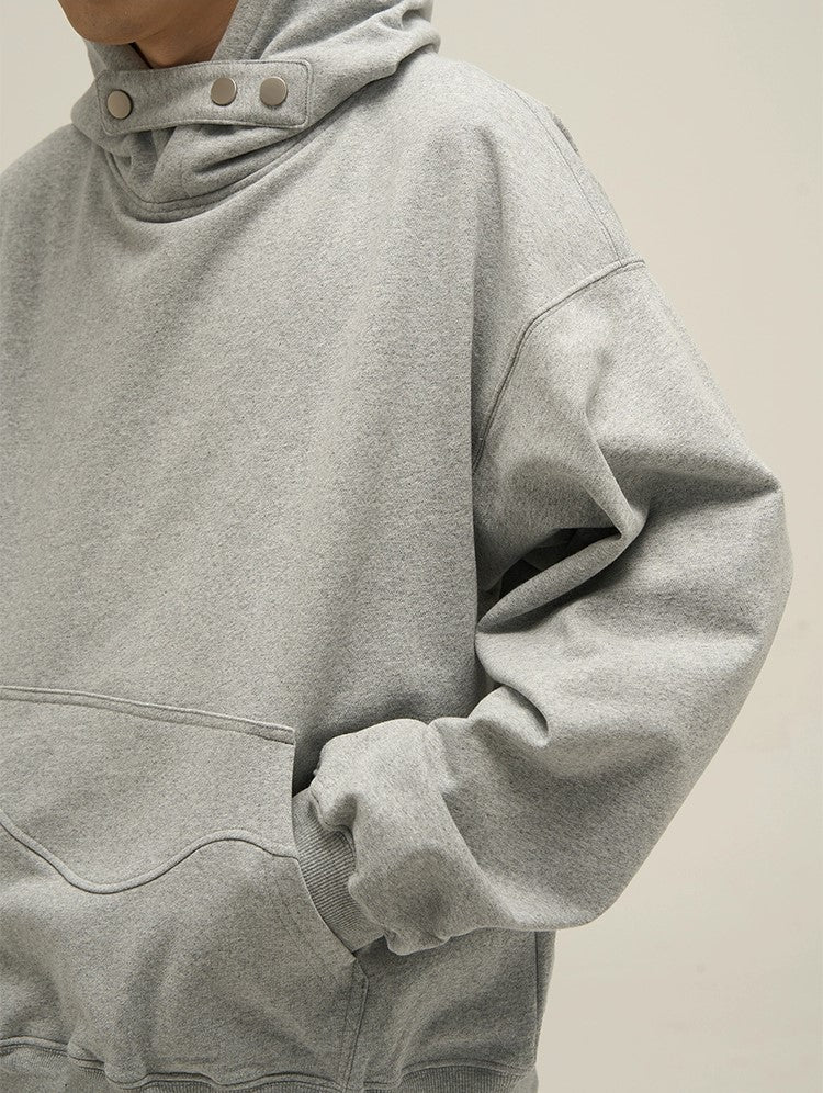 Felpa oversize con cappuccio a collo alto
