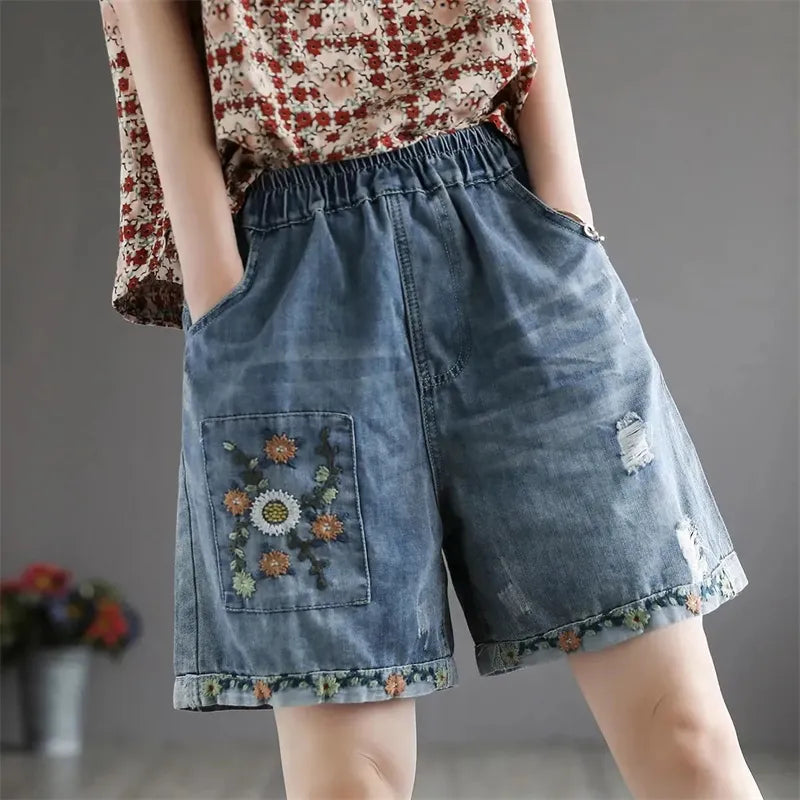 Vintage denim shorts met bloemenborduursel