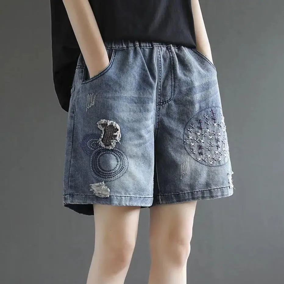 Vintage denim shorts met bloemenborduursel