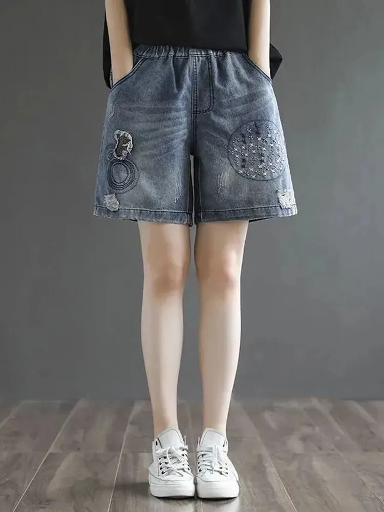 Vintage denim shorts met bloemenborduursel