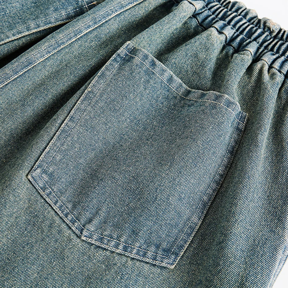 Pantaloncini in denim con stampa divina