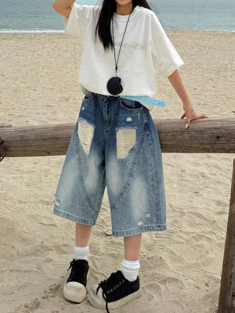 Jean vintage taille haute déchiré