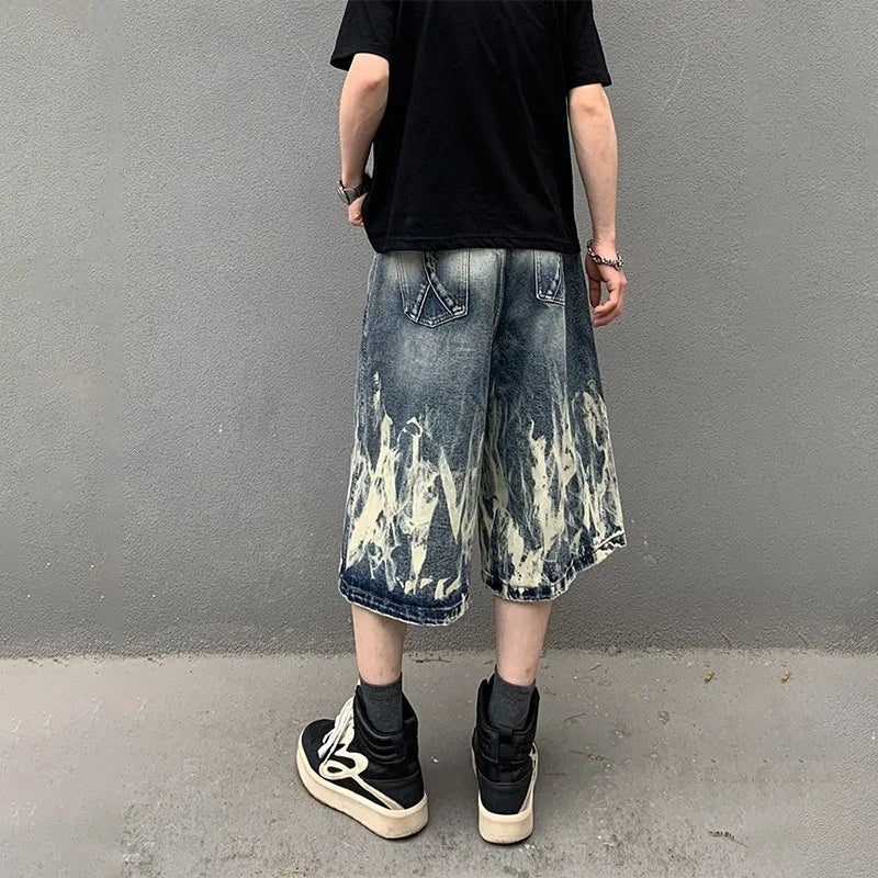 Pantaloncini in denim con stampa grafica a fiamme