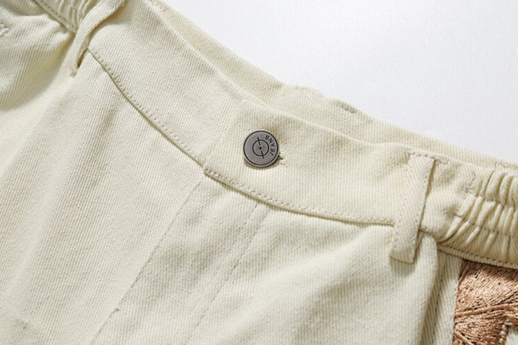 Pantaloncini di jeans con patchwork floreale