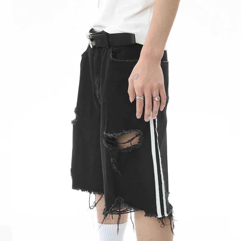 Pantaloncini di jeans strappati con strisce laterali