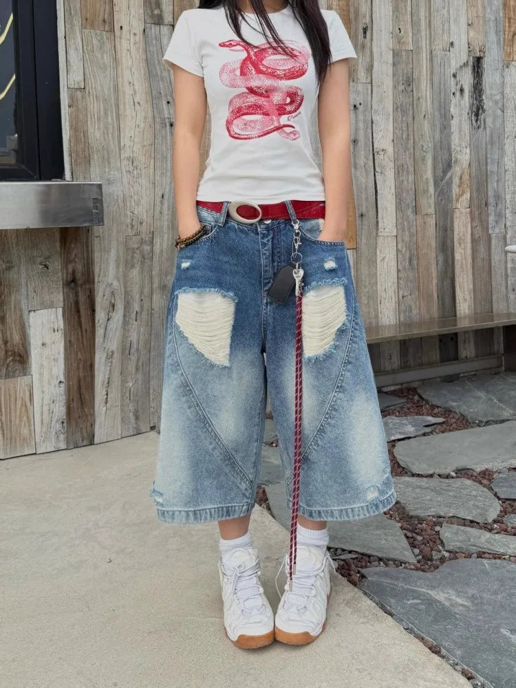 Jean vintage taille haute déchiré