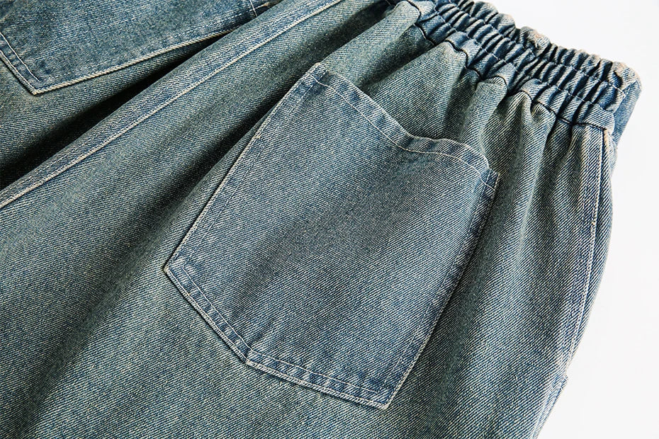 Pantaloncini in denim con stampa divina