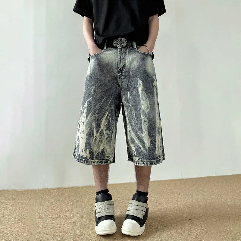 Pantaloncini in denim con stampa grafica a fiamme