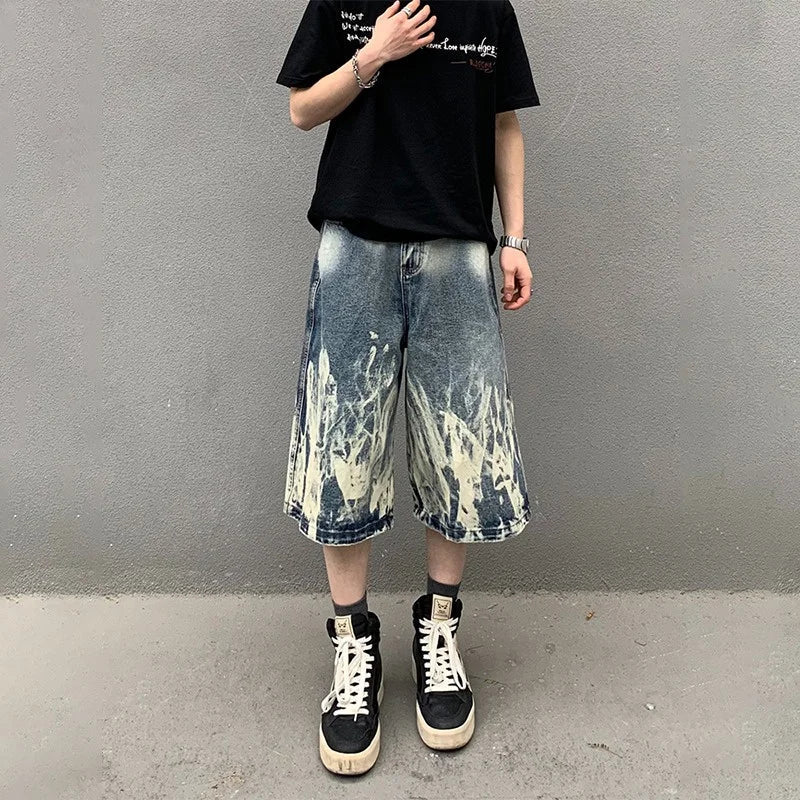 Pantaloncini in denim con stampa grafica a fiamme