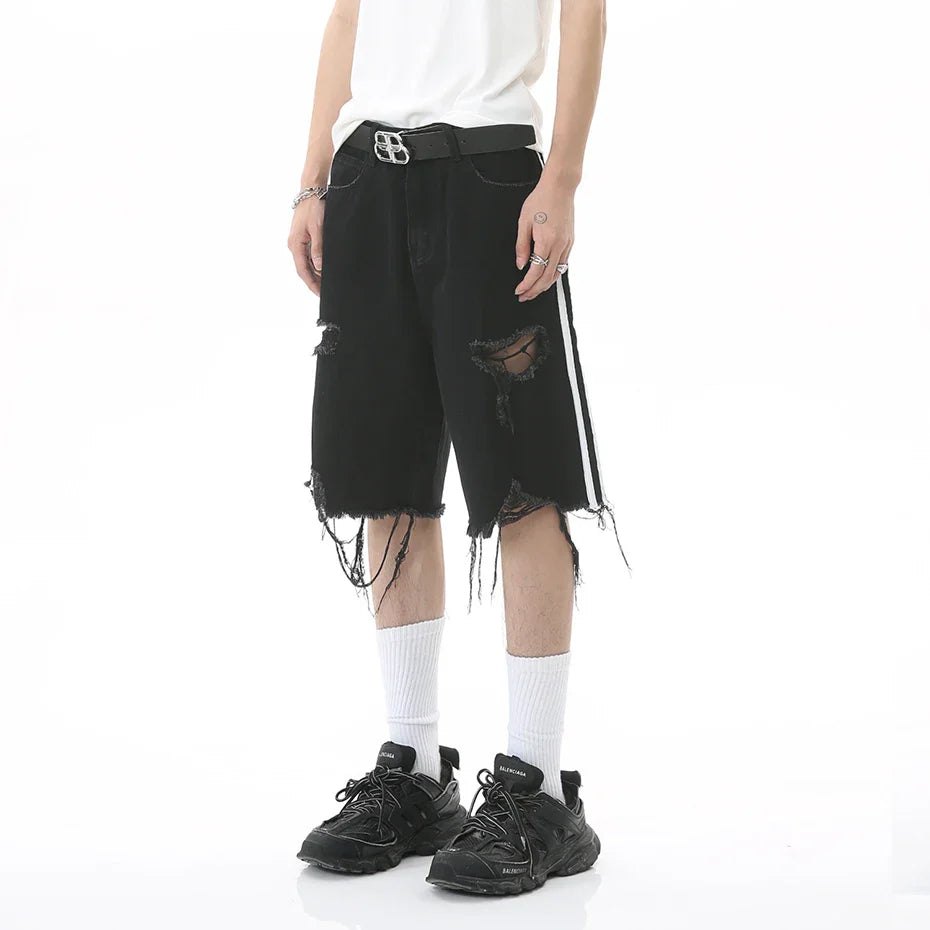 Pantaloncini di jeans strappati con strisce laterali