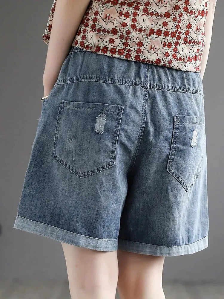 Vintage denim shorts met bloemenborduursel