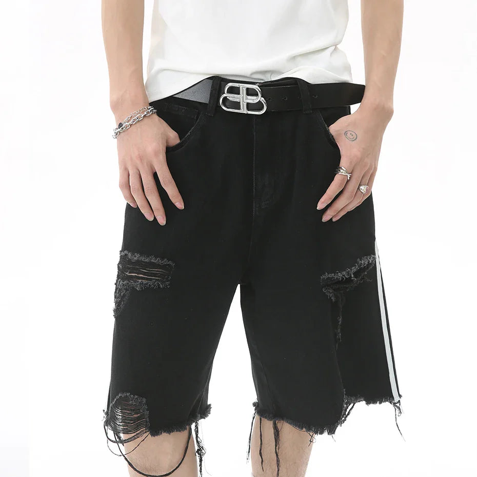 Pantaloncini di jeans strappati con strisce laterali