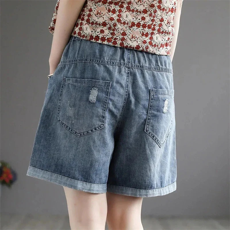 Vintage denim shorts met bloemenborduursel