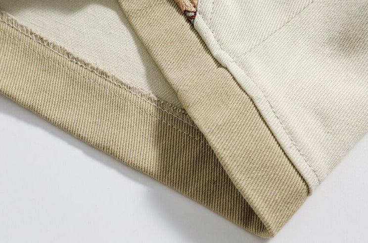 Pantaloncini di jeans con patchwork floreale