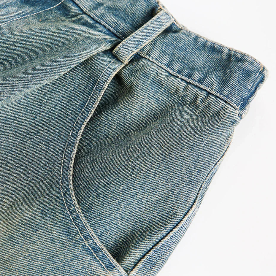 Pantaloncini in denim con stampa divina