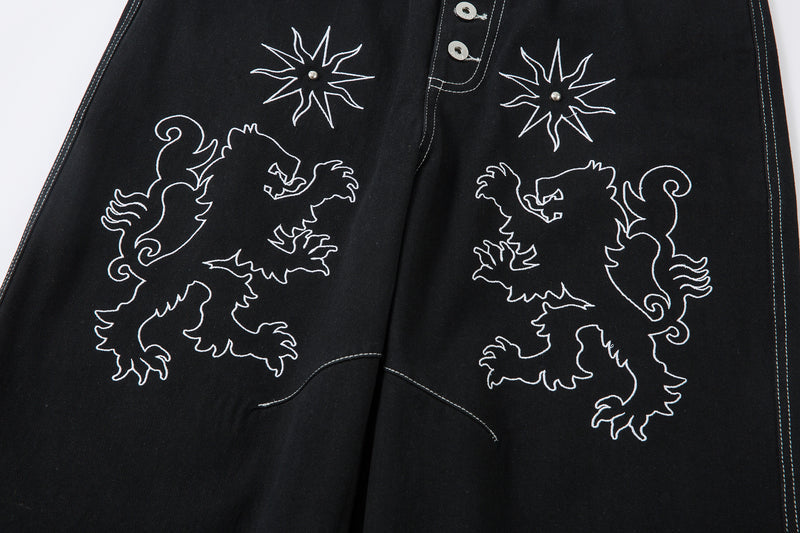 Madxmarx Embroidered Crest Wide-Leg Jeans