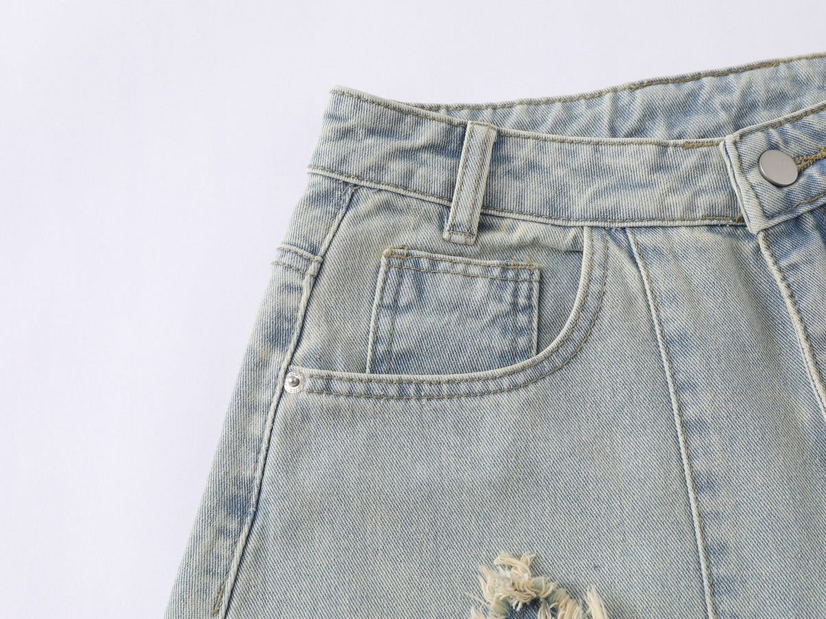 Jeans de pierna ancha con efecto desgastado y estrellas de Madxmarx
