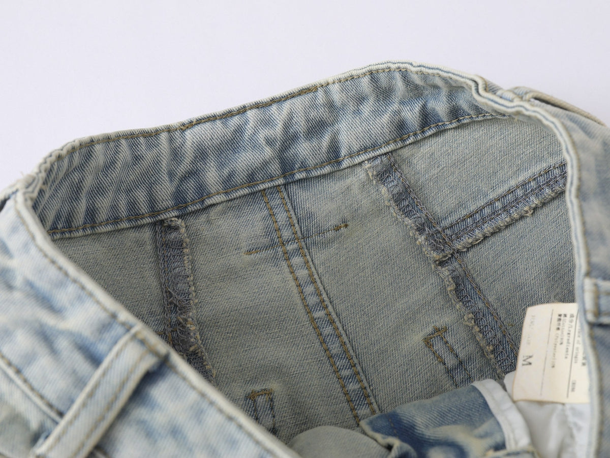 Jeans de pierna ancha con efecto desgastado y estrellas de Madxmarx