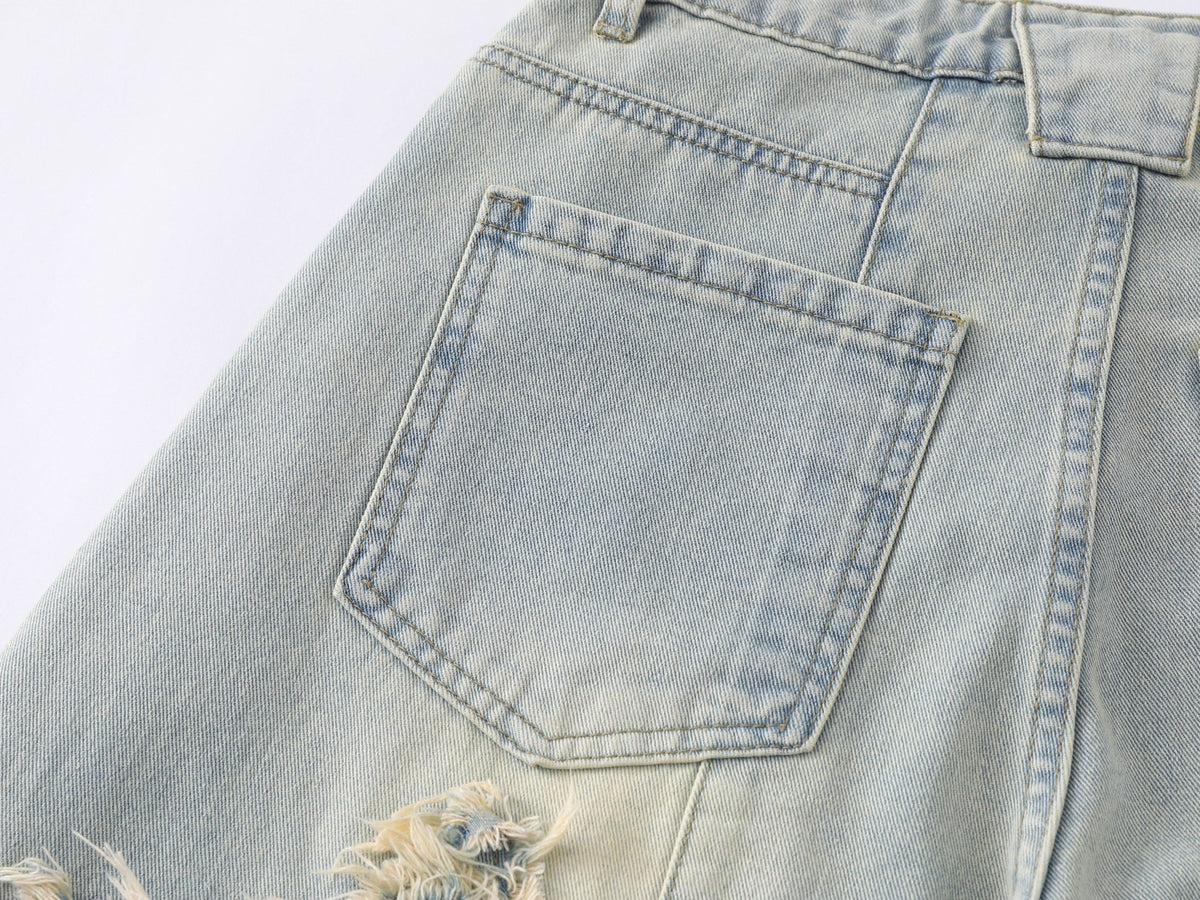 Jeans de pierna ancha con efecto desgastado y estrellas de Madxmarx