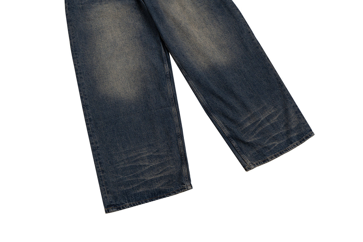 Madxmarx Distressed Leather Patch Denim Jeans