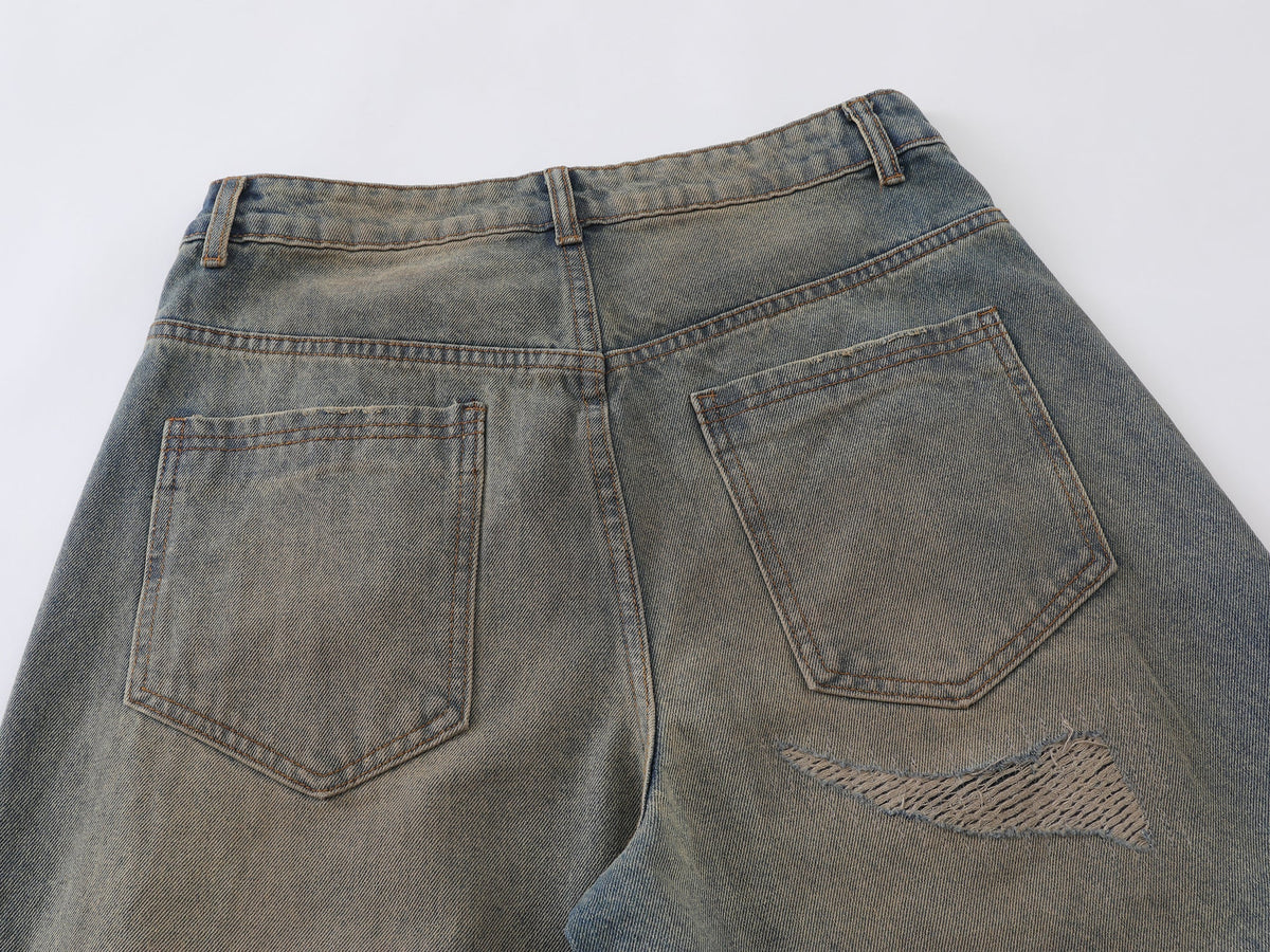 Pantalon en jean incurvé effet vieilli Madxmarx